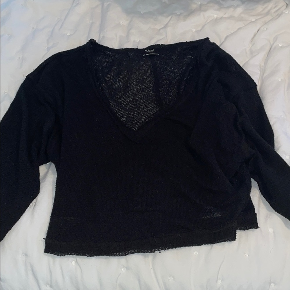 Out from under long sleeve shirt